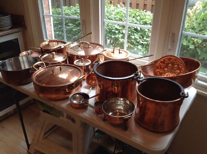 Many pieces of copper....pots and pans with copper lids, some are hammered older pieces, jello molds, ladles, bowls etc....some marked All Clad for brand...presale available