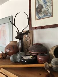 Lots of fun Native American pots, and this cute bronze deer