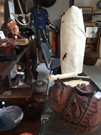 The white piece is stingray skin, used for handles in many variety of swords, Samurai in particular. This is a large piece and several smaller ones. Makes great knife grips