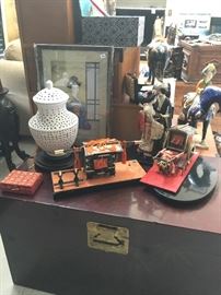 Sturdy chest and vintage figurines