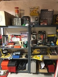 More tools and supplies in basement, as well as good usable shelving units