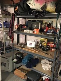 Camping supplies and safety items along with a portable toilet and hammock