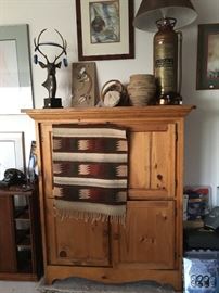 Nice hutch for storage and a classic copper fire extinguisher lamp
