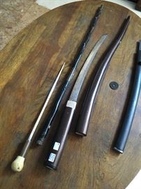 Very unusual walking canes with swords hidden in stride