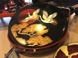 Large round lacquer container with brilliant designs