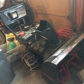 Besaste of a snow blower. This 10 horsepower unit is perfect for large driveways and small parking lots - and will make you the hit of the neighborhood this winter