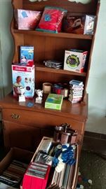 DVDs, Tapes, Cards, Poker chips, Card Shuffler, Various knick knacks, furniture