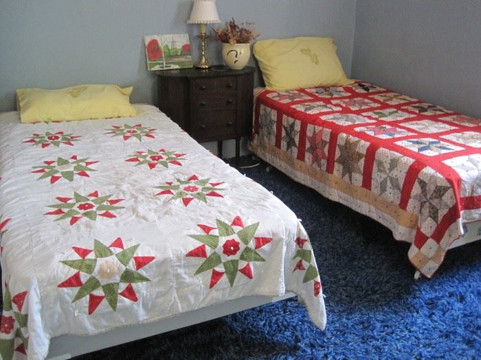 antique quilts on twin beds