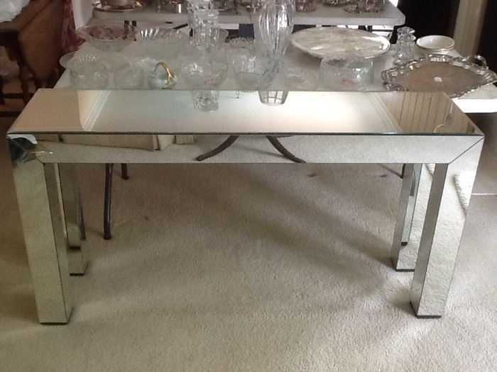 All mirror side table 5 feet long 31 " high and 16 " deep.  Beautiful
