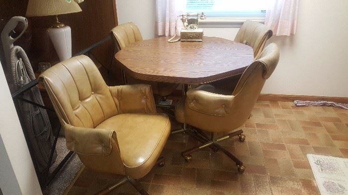 Vintage Kitchen Table with Rolling Chairs