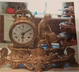 Italian Gilt Bronze Mantle Clock with sitting Goddess, German made internal clock works.