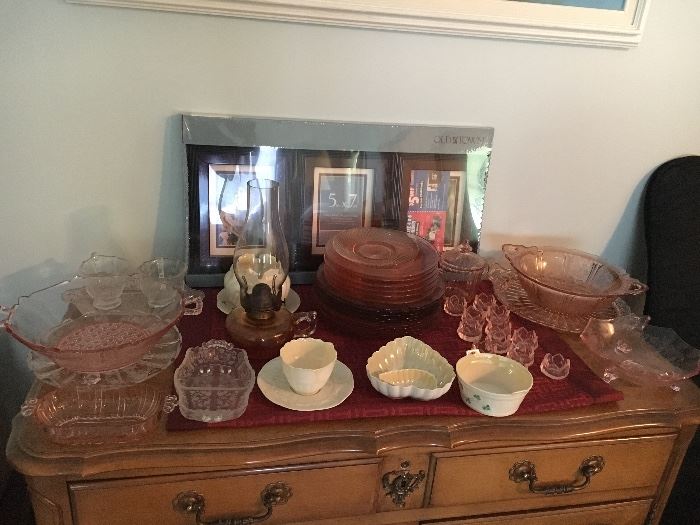 Several pieces of pink depression glass