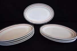 8 Steak Platters Vitrified Jackson China: 8 heavy steak platters Vitrified Jackson China made in U.S.A. Falls Creek, PA with black & brown rim trim. Very good condition with a few utensil marks.
