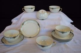6 Hand Painted Cups and Saucers by Noritake: Antique made in Japan "Glendora" pattern U.S. design patented 7408 Blue Scrolls. Flowers. Gold Trim. Circa 1918 in excellent condition free from chips, cracks, discoloration, breaks, or stain and only mild use. Black Border. 