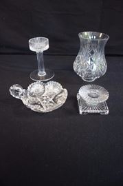 Crystal Cut Glass: Hurricane Candle stick (13"), candy dish with  handle (6"), pair of short 3.75" square/round candlesticks They are in great condition for their age with no damage like chips or crack1930-50's) This lot is in very good condition and shows little wear, if any