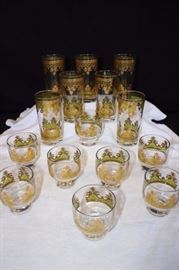 14 Signed Georges Briard Bar Glasses: 7 - 12 oz. highball 22k gold & green, 8- 6 oz. Martini glasses one with  small chip on rim otherwise in very good condition. (1950-60's).
