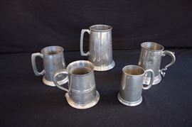 5 Genuine Pewter Mugs Made in England: B3+B428 7" marked English Pewter Sheffield; 5" with rounded handle, marked with 4 hallmarks and Made in Sheffield England; 5.5" English pewter made in England; 4.5" marked Pewter English Made 3819;5" with squared off handle marked English Pewter Raimond Viners of Sheffield Made in England.  The bottom rim on 2 musgs needs a little reshaping.The pewter has an aged, darkened look; over all condition is good, but with that time worn feeling of having been around for a long time. If you love the feeling of old pewter, that soft, silvery-gray aged look, then you will love these. The bottom rims on two mugs could be reshaped, which is quite easy ... sit piece(s) out in the sun and pewter becomes very pliable.