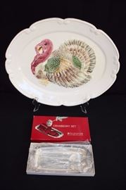Vintage Turkey Platter & Cranberry Set: Platter is  embossed with hand painted turkey is marked "NORTHINGON MADE IN USA". Measures 20" X 16" in excellent condition. Cranberry Set WM. Rogers Silverplate in original box, with serving tray with spoon from 1940. Silver plated cranberry set with a tray and a spoon new in box . Art Nouveau style spoon with filigree flowers . Tray measures 10" X 5"; spoon measured 8". All This lot is in very good condition and shows little wear, if any.