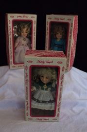 Three 8" Shirley Temple Dolls: all marked on back "IDEAL 1982 Hong Kong" in original boxes. All 3 have 3-point articulation with sleepy eyes, painted face and rooted hair.  Their outfits are all complete including shoes (Heidi doesn't have a hairnet). The collection includesThe Little Colonel,Stowaway and Heidi. All are in excellent condition and do not look as if they have been played with or displayed. 