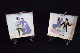 Decorative Vintage Plates:  Two complementary themed plates both marked "Cleminsons", 7.5" 7.5". Feature Victorian dressed lady and gentleman.  Curvy rims with lavender bows at the top. Other than faded ribbons, This lot is in very good condition and shows little wear, if any.