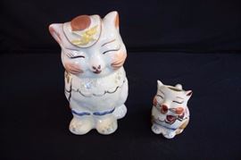 Vintage Cooke Jar with Creamer:  Cat themed porcelain, stamped "Puss in Boots, Made in USA, Patented".  Large cat cookie jar with removable lid and small cat creamer. This lot is in very good condition and shows little wear, if any.
