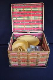Vintage Picnic Basket: Red, tan and orange two handled basket with hinged lid, measures 15.5" x 14.5".  Includes 1) 24 Chef Classic utensils in unopened packages 2) Eight plates with sun image stamped "Oneida" 3) One serving bowl stamped "OD" 4) Eight small bowls stamped "Oneida" 5) Four medium bowls stamped "Oneida" 6) Eight large bowls stamped "OD 2247" 7) Two serving platters stamped "OD".  This lot is in very good condition and shows little wear, if any.