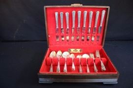 Antique Silverware Boxed Set: Beautiful silver-plated "Plantation" by 1881  Rogers by Oneida Ltd., purchase date Sept 17, 1948 through dealer E.H. Mulolland Watchmaker Jeweler.  Includes original wooden box, tags and pamphlets.  Utensil count:  11 French hollow knives, 2 dinner forks, 7 grill forks, 5 salad forks, 8 round soup spoon, 2 table spoons, 1 sugar spoon, 5 small iced tea spoon, 7 soup spoons.  Silverware bears a heavey over-all plate of Pure Silver and the most used pieces have extra silver at the wearing point. Some are slightly tarnished