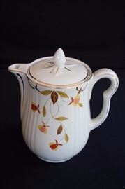 Hall’s Superior Coffee Pot: Coffee Pot: with lid by Hall's Superior, Autumn Leaf Jewel Tea 1930-70's, marked on the bottom HALL'S SUPERIOR TESTED AND APPROVED BY Mary Dunbar JEWEL HOMEMAKERS INSTITUTE QUALITY KITCHEWNWARE.  It is a large pot that measures: spout to handle 8", mouth 4", 9.5" tall. It is faintly marked on the bottom and marked on the bottom inside FOR PIPING HOT COFFEE PREHEAT WITH HOT WATER DO NOT PLACE OVER OPEN FLAME. The graphics are in excellent condition and the water pitcher is in very good condition, no chips or cracks.