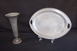 Two-Piece Pewter Lot:  Oval pewter platter with handles  measures 16" by 12" and is marked on the bottom Insico Pewter with logo 15/508; needs cleaning and some reshaping.  Flared pewter vase 10.5" tall with 4.5" diameter marked on the bottom Insico Pewter with logo 11/506 lip needs a little reshaping, which is quite easy ... sit piece(s) out in the sun and pewter becomes very pliable.