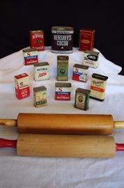 Vintage Spice Tins and Rolling Pins: 11 Metal Spice Tins and 2 Cardboard Spice Boxes all with spices by Schilling, French's, Roosevelt Brand, Richelieu, Iris, Durkee, J.R. Watkins, Ben Hur, and Hershey's.  Wooden Rolling Pin with white with handles measures 18" and Rolling Pin with red with white handles measures 16". All in good vintage condition (check out the photos!)