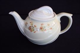HALL'S Superior Drip-O-Lator: coffee pot with lid by Hall was produced for the Enterprise Aluminum Company Circa 1960's.  Hall, well known for their teapots and other products, made their wares for many other companies.  This coffee pot is decorated with sweet dogwood flowers and vines on both sides and has all the beautiful lines of a Hall product.  It is a large pot that measures approximately 7" tall by 11" across mouth is 3.5"  The graphics are in excellent condition. It is marked on the bottom THE ENTERPRISE ALUMINUM CO. MASSILLON, OHIO, SUPERIOR QUALITY KITCEHN WARE Drip-O-later TRADE MARK REG. U.S. PAT. OFF. PTENT NOS.1370782-1743925. It is faintly marked on the bottom inside FOR PIPING HOT COFFEE PREHEAT WITH HOT WATER DO NOT PLACE OVER OPEN FLAME. The graphics are in excellent condition and in coffee pot is in very good condition, no chips or cracks.