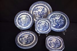 Willow Pattern Lot:  13 pieces total.  6 square-rou9nd plates, 7.5" square; 5 dinner plates 9.75" diameter.  Plates are all marked on bottom Willow Johnson Bros. England A Genuine Hand Engraving IRONSTONE; 2 serving dishes in Willow pattern are marked Microwave & Dishwasher Safe Est. 1795 CHURCHILL Made in England.  Platter is 12.75" diameter, bowl is 11.25" diameter.  This lot is in very good condition and shows little wear, if any - no chips or cracks.