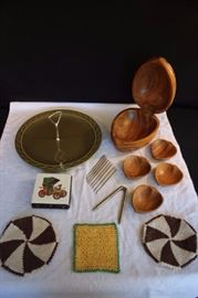 TV Watching Snack Lot: 1970's 12.5" pottery hors d oeuvres platter, with handle 5" tall; solid wooden nut set with covered nut bowl, 9" x 6" wide stands 6" tall, 4 individual nut dishes 4.25" long x 3.5 wide 1" deep; 5" nut cracker marked HMQ and eight 4.75" picks; 3 hand crocheted potholders or coasters, 2 octagonal brown & white (6.5") and 1 yellow & green 5.25" square; ceramic tile  holder for 6 pull out boxes for stick matches decorated with an 1899 Fiat (small chip on one corner). Ceramic platter is in very good condiiton, no chips or cracks the other other pieces are in good vintage condition and show little wear, if any.