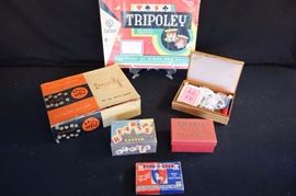 Vintage Lot of Games:  Two 1914 Hearts by Parker Brothers in original boxes each different; Very old WORD-O-GRAM "The Sensation New Word Game by Gropper Toys Brooklyn NY with instructions in original box; 1957 Spill and Spell by Phillips Publishers, Inc. Newton 58, Massachusetts, U.S.A. with 2 original covered cups, with 15 green lettered dice in each and 2 covered cups (w/out APP'd For) with 14 white lettered dice with two sets of instructions in a tattered original box; vintage travel game set from Metro Games New York in genuine leather snap front case with early plastic chips - yellow, red, white, blue and plastic checker and chess pieces with later full set of poker cards by U.S. Playing Card Co., Cincinnati, Ohio 45212; 1965 Tripoley De Luxe Edition by Cadaco Card Game with Mat, Hearts, Poker & Rummy with instructions in original box. All in very good vintage condition. (See photos)