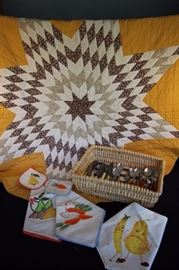 Miscellaneous Flatware & Linens:  1970';1 round gold & brown table cloth machine quited 55" diameter; 2 sets of machine embroidered 22" x 12" dishtowels and 5.15" potholders 1 with carrots, the other with pears; hand painted dishtowel 16.75" with pear and banana; 6- piece "mocha" colored Bakelite flatware, 2 forks marked Sta Brite Stainless and 5 tablespoons marked ... stainless U.S.A.; 8-piece buttercup" colored,  9"  dinner knife marked General Cutlery Co. Stainless Steel, 7: fork marked stainless steel, 2 6.5" teaspoons marked stainless steel, 6 7.5" tablespoons marked stainless steel; 7 9" knives with ivoriy-like handles marked IXL Wolstenholme & Son Sheffield- England and 7" forks with ivory-like handles marked IXL George Westemsoln England.