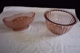 1920-40's Pink Glass: 1.5 quart pink depression glass serving/mixing bowl, 4.5" tall 8.25" diameter; 1920-30's pink oval frosted flower arranger with rare insert which has a slight chip & crack, 3.74" tall, 8.25" wide,  3.75" across. Other than the rare insert, the lot is This lot is in very good condition and shows little wear, if any - no chips or cracks.