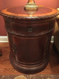 Pair of Round Mahogany Carved Inlayed 1 Door, 1 Drawer Tables (24’’ x 28’’)
