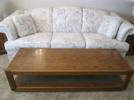 Sofa sleeper, pale, pastel floral upholstery. MCM wood Coffee Table