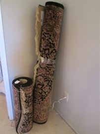 Wool Rug and Runner, black and darker tones.  Large rug size:  8'6" X 5' 6" by Capal