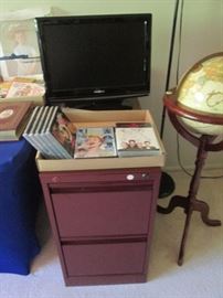 2-Drawer File, Music, Globe on a floor stand, and flat screen T.V.