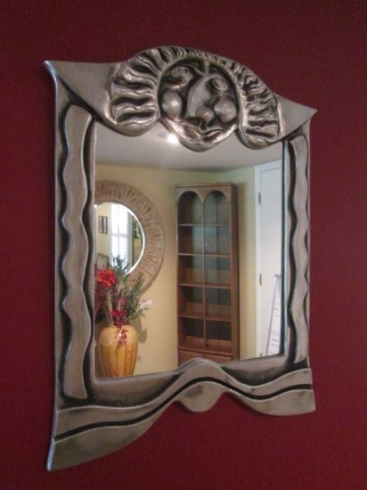 Sculptured mirror by Drumm