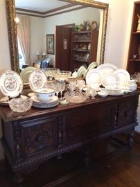 Wedgwood Imari Crane, an extensive set of Royal Doulton, Galway Crystal wine glasses, a statement mirror and a generous hardwood vintage reproduction buffet...best estate sale this weekend!