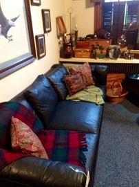 Very long mid-century "leatheresque" black lounge sofa...fantastic condition, fantastic price!