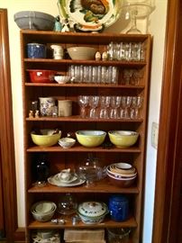 Seven shelf Arts and Crafts book case filled with vintage Pyrex mixing and nesting bowls, dazzling crystal, and the the most sensational turkey platter ever!