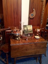 Yes, it is yet another wonderful drop leaf table with a couple of more hand turned Windsors and copper cookware.