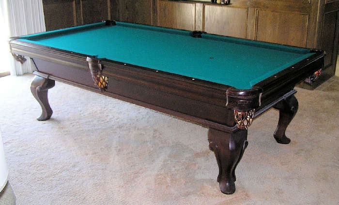 Olhausen Competition Billard Table with Cover, Balls and the following cue sticks: 4 Dufferin 17,19,1920 oz.and a 19oz Minnesota Fats Pro.  Table 98"L x 54"W