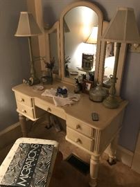 A super nice vanity with trifold mirror