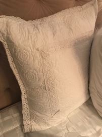 Two large white pillows for the bed.