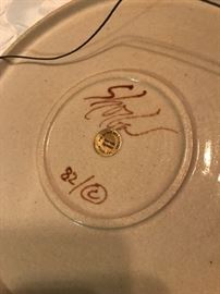 signature and year of production on plate