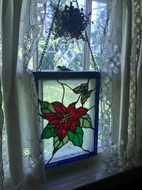 One of many stained glass hangings. 